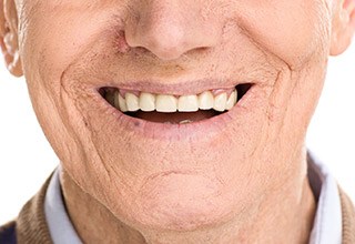 Close up of an older man smiling