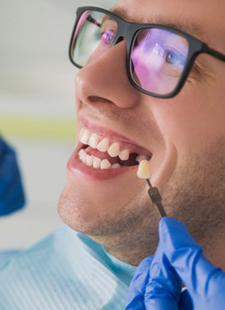Replace missing teeth with dental implants near Mendota Heights