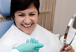 Smiling woman in dental chair