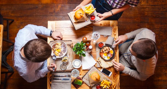 Family gathering at kitchen table