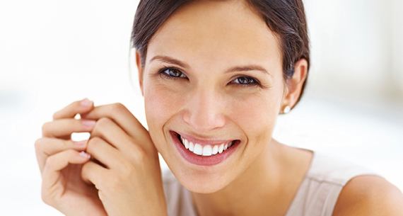 Young brunette woman smiling