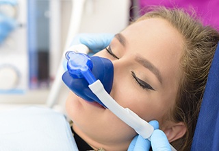 Patient with nitrous oxide nose mask